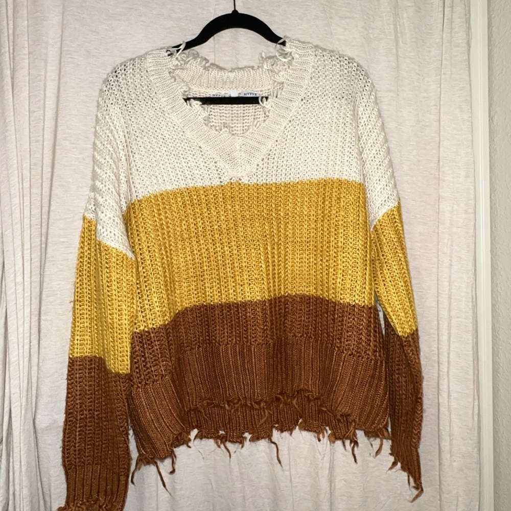 Distressed knit sweater